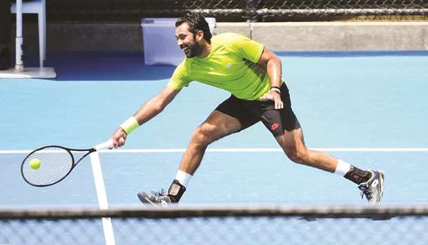 Pakistanu2019s Aisam-ul-Haq Qureshi in action during a practice session in Melbourne yesterday. (AFP)