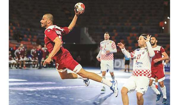 Action from the match between Qatar (in maroon) and Croatia (in white) during the preliminary rounds of the IHF Men's World Championship in Cairo, Egypt, on Tuesday. PICTURES: Noushad Thekkayil