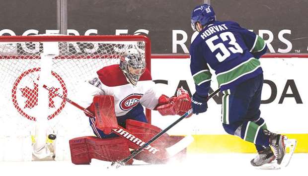 Bo Horvat of the Vancouver Canucks scores what proved to be the game winning goal against the Montreal Canadiens in the shootout at Rogers Arena in Vancouver on January 20, 2021 in Vancouver, Canada. (Getty Images/AFP)