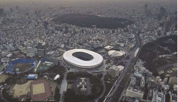 An aerial view shows the National Stadium, the main stadium of Tokyo 2020 Olympics and Paralympics, ahead of the six-months countdown to the Tokyo Olympics yesterday. (Kyodo/Reuters)