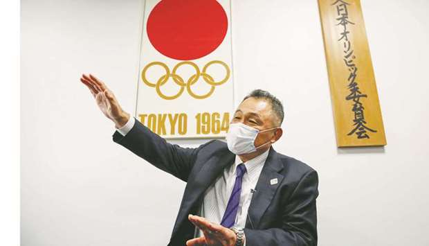 President of Japanese Olympic Committee Yasuhiro Yamashita wearing a protective mask, amid the coronavirus disease (Covid-19) outbreak, speaks during an interview with Reuters in Tokyo yesterday.