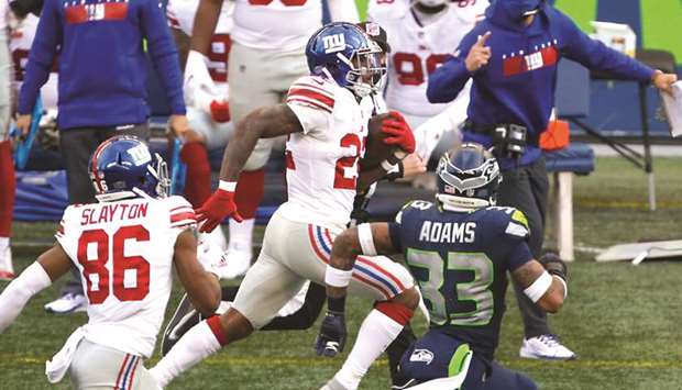 New York Giants running back Wayne Gallman rushes against the Seattle Seahawks during the third quarter at Lumen Field in Seattle on December 6, 2020. (USA TODAY Sports)