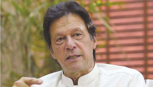 Prime Minister Khan: timelines should be set for completion of low-cost housing.