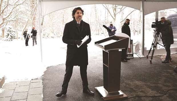 Prime Minister Justin Trudeau leaves a news conference at Rideau Cottage, as efforts continue to help slow the spread of the coronavirus disease, in Ottawa, Ontario, Canada.