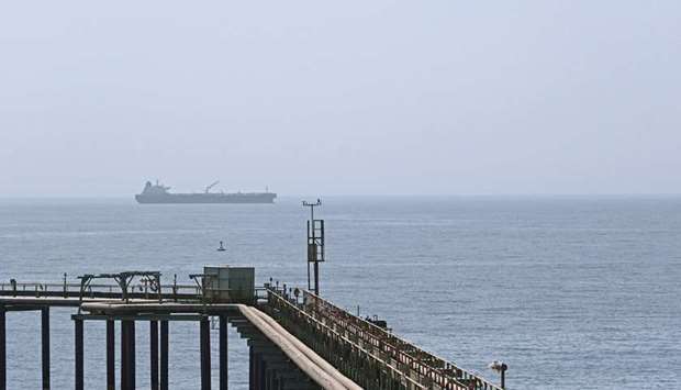 A view of an oil tanker leaving the Zueitina oil terminal in Zueitina, west of Benghazi (file). Libya increased production from almost nothing in September to about 1.3mn barrels a day this month after a truce between warring factions enabled the NOC to reopen many fields and ports.