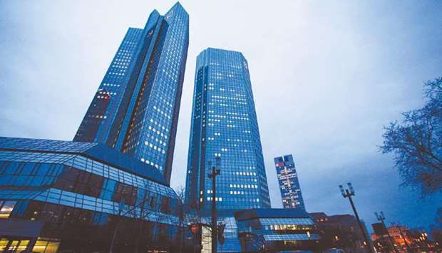 Lights illuminate the windows of Deutsche Bank headquarters in Frankfurt. Deutsche Bank and Barclays got the two biggest fines at 8.7mn pesos and 6.35mn pesos, respectively for the alleged price rigging in the peso bond market in Mexico.
