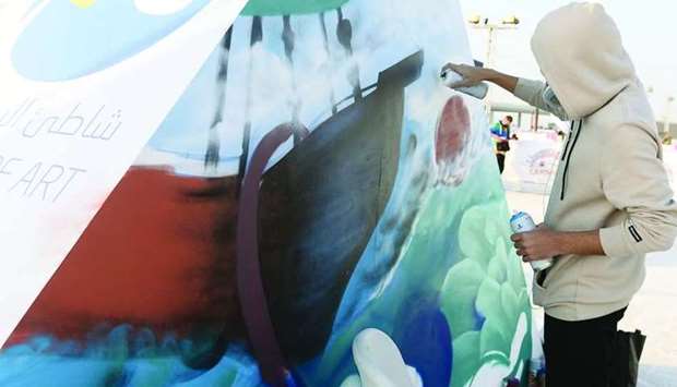 Hassan Behoo's art at the carnival features Qatari traditions and football. PICTURES: Shaji Kayamkulam.