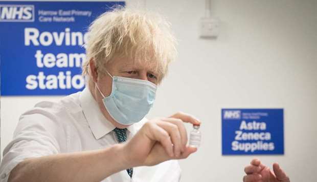 British Prime Minister Boris Johnson visits coronavirus vaccination centre