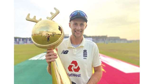 England captain Joe Root with the series trophy.