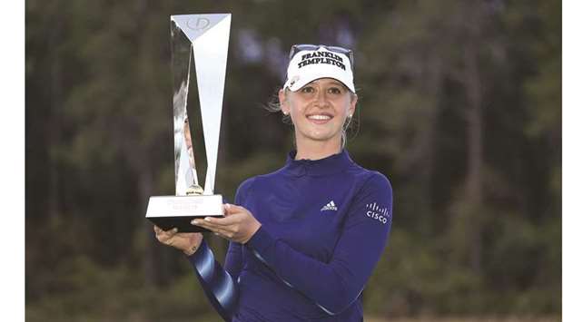 Jessica Korda poses with the trophy after winning the Diamond Resorts Tournament of Champions at Tranquilo Golf Course at the Four Seasons Golf and Sports Club in Lake Buena Vista, Florida. (Getty Images/AFP)