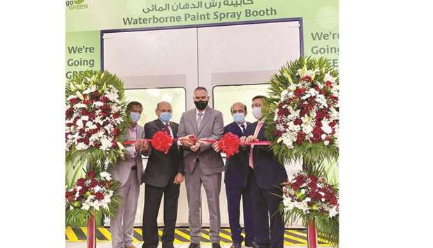 Officials opening AABu2019s waterborne paint spray booth.