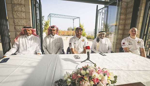 Qatari rally driver Khalid al-Mohannadi (centre) with his Russian co-driver Kirill Shubin (right), CEO of Universe Sports Marketing Mohamed Mubarak al-Mohannadi (second right), Vice Chairman of the Board of Directors Adel Khamis (second left) and Khalid Abdulla al-Binali, Head of Protocol and Public Relations during a press conference yesterday.