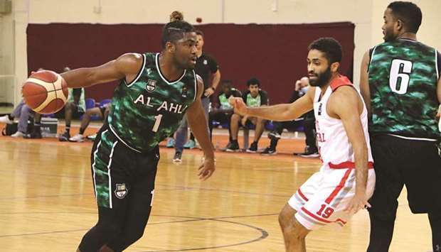 Action from the match between Al Shamal (in white) and Al Ahli (in green and black) yesterday.