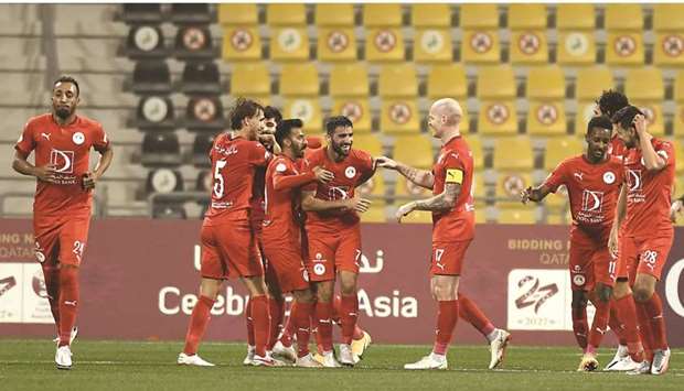 Al Arabiu2019s Mehrdad Mohammadi celebrates after scoring a penalty against Umm Salal in the Amir Cup last 16 match at the Suheim Bin Hamad Stadium yesterday. PICTURE: Shemeer Rasheed