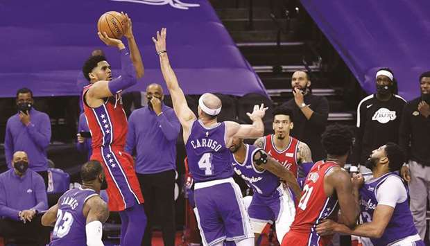 Tobias Harris (left) of the Philadelphia 76ers shoots the go-ahead basket against the Los Angeles Lakers at the Wells Fargo Center in Philadelphia. (Getty Images/AFP)