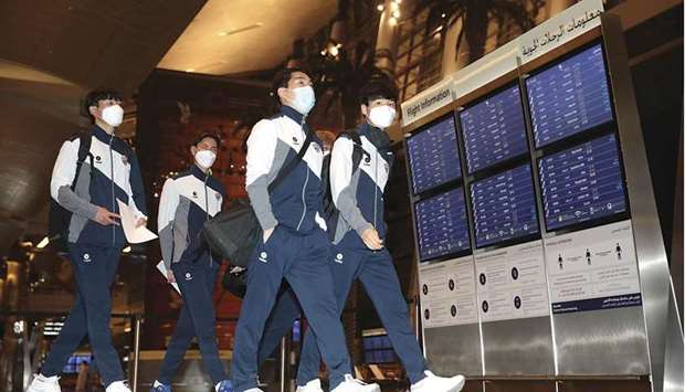 Ulsan Hyundai FC players arrive at Hamad International Airport in Doha yesterday.