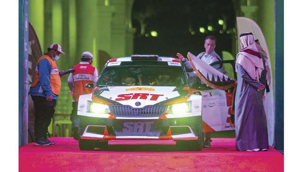 Kris Meeke of Northern Ireland crosses the start line on his first ever MERC event in Qatar yesterday.