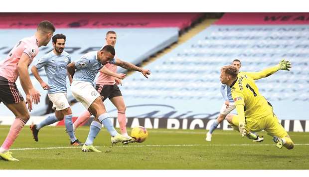 Manchester Cityu2019s Gabriel Jesus (third left) scores against Sheffield United during the Premier League match in Manchester yesterday. (AFP)
