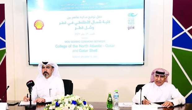 Qatar Shell Pearl GTL deputy general manager Rashid al-Sulaiti and CNA-Q president Dr Salem al-Naemi at the signing ceremony Sunday. PICTURE: Shaji Kayamkulam.