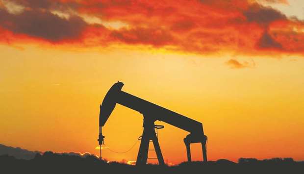 An oil pump is seen at sunset outside Scheibenhard, near Strasbourg, France (file). The poll of 39 economists and analysts conducted in the second half of December forecast Brent crude prices would average $50.67 per barrel this year.