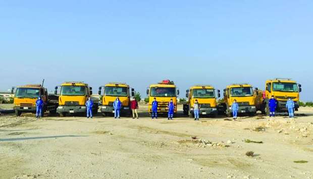 A fleet of trucks are deployed to transport abandoned vehicles
