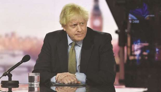 A handout picture released by the British Broadcasting Corporation (BBC) shows Prime Minister Johnson appearing on The Andrew Marr Show weekly political programme at their studio in London.