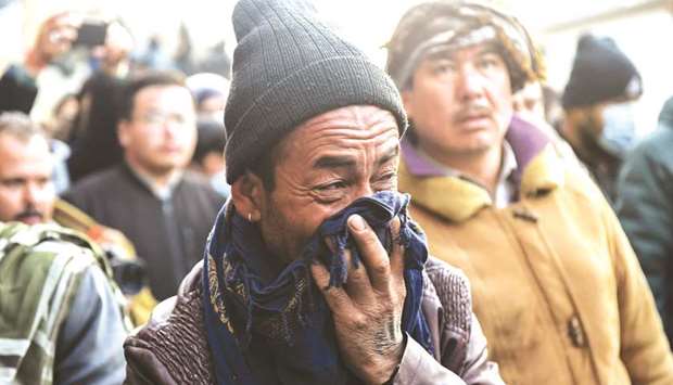 A member of Hazara community mourns the death of his relative in Quetta yesterday. (AFP)