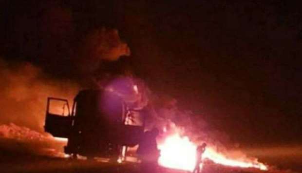 A picture being shared on social media that shows the attacked bus in flames in the Wadi al-Azib area of Hama province