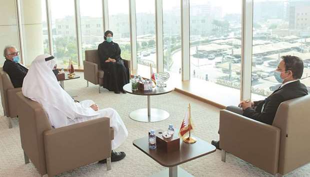 HE the Minister of Public Health Dr Hanan Mohamed al-Kuwari on Monday  meets the first two recipients of Covid-19 vaccine in Qatar as Dr Abdullatif al-Khal looks on.