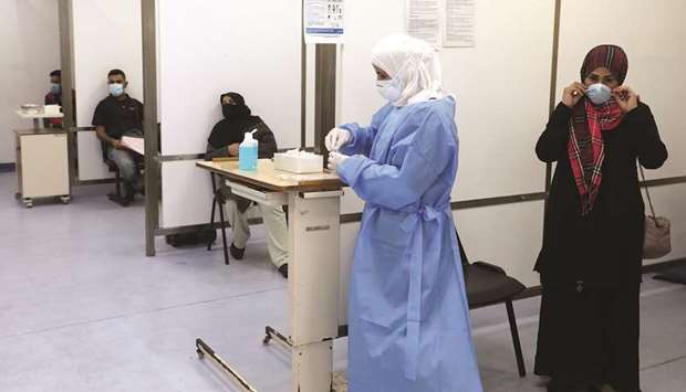 People wait to get tested for the coronavirus disease (Covid-19), at Rafik Hariri University Hospital, in Beirut, yesterday.