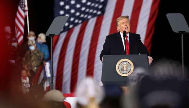 US President Donald Trump speaks during a rally in support of Republican incumbent senators Kelly Loeffler and David Perdue ahead of Senate runoff in Dalton, Georgia on January 4