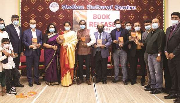 Guests and organisers pose for a group photo at the book launch. PICTURES: Jayan Ormaa