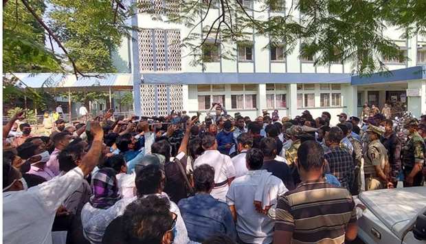 Media and police personnel gather outside the district general hospital at Bhandara in the Indian state of Maharashtra. AFP