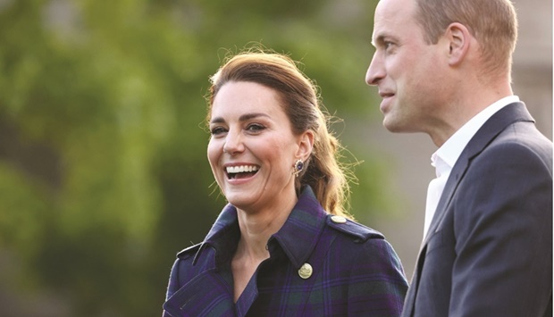 This photo taken on May 26, 2021 shows Prince William and Catherine arriving to host a drive-in cinema event for National Health Service (NHS) staff at the Palace of Holyroodhouse in Edinburgh.