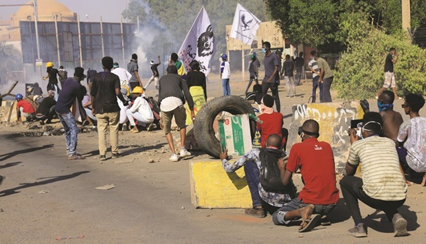 Resistance committee flags are seen during a rally on Sunday against the military rule following last monthu2019s coup in Khartoum.