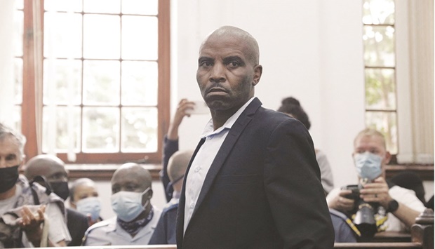 Zandile Christmas Mafe, a suspect in connection to a fire at the South African Parliament, appears at the Magistrate Court in Cape Town, yesterday.