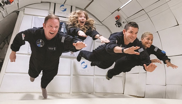 DELIGHTED: The Inspiration4 crew of Chris Sembroski, Sian Proctor, Jared Isaacman and Hayley Arceneaux enjoy zero gravity conditions on September 15, 2021. (Reuters)