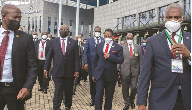 Led by security, Southern African Development Community (SADC) Chair Malawiu2019s President Lazarus Chakwera (centre-right) and Chairperson of the SADC Organ on Politics, Defence, and Security Co-operation, South African President Cyril Ramaphosa (centre-left) walk side by side at the end of the SADC Heads of State Extraordinary summit on the state of security in Mozambique, in Lilongwe, yesterday.