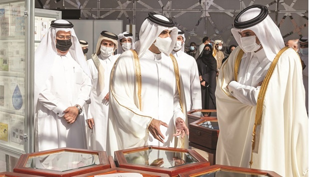 HE the Prime Minister and Interior Minister Sheikh Khalid bin Khalifa bin Abdulaziz al-Thani listening to a briefing by HE the Minister of Culture Sheikh Abdulrahman bin Hamad al-Thani after inaugurating the 31st edition of the Doha International Book Fair on Thursday.