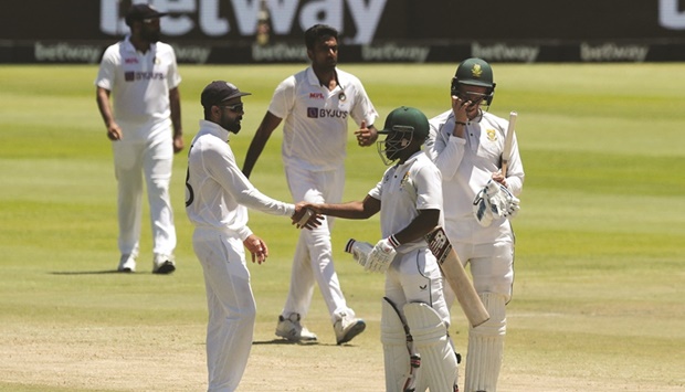 Indiau2019s Virat Kohli shakes hands with South Africau2019s Temba Bavuma after the third Test in Cape Town yesterday. (Reuters)