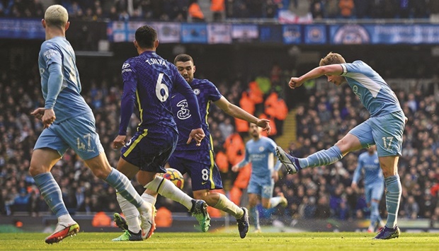 Manchester Cityu2019s Kevin De Bruyne (right) scores against Chelsea in the Premier League in Manchester yesterday. (AFP)