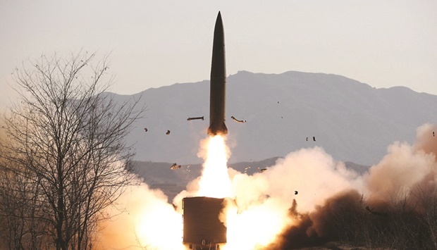 A railway-born missile is launched during firing drills according to state media, at an undisclosed location in North Korea.