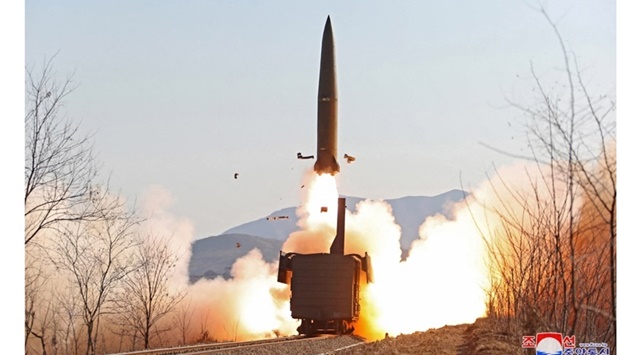 A railway-born missile is launched during firing drills according to state media, at an undisclosed location in North Korea, in this photo released January 14 by North Korea's Korean Central News Agency (KCNA). KCNA via REUTERS