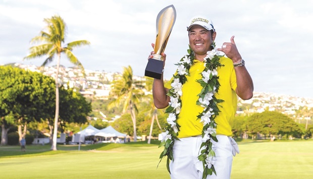 Hideki Matsuyama hoists the trophy after winning the Sony Open at Waialae  Country Club, Honolulu, Hawaii. (AFP)