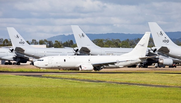 A Royal Australian Air Force P-8 Poseidon aircraft prepares to depart RAAF Base Amberley, Queensland to assess the damage to Tonga after the eruption of an underwater volcano triggered a tsunami and blanketed the Pacific island with ash, in Amberley, Australia January 17.. LACW Emma Schwenke/Australian Department of Defence/Handout via REUTERS