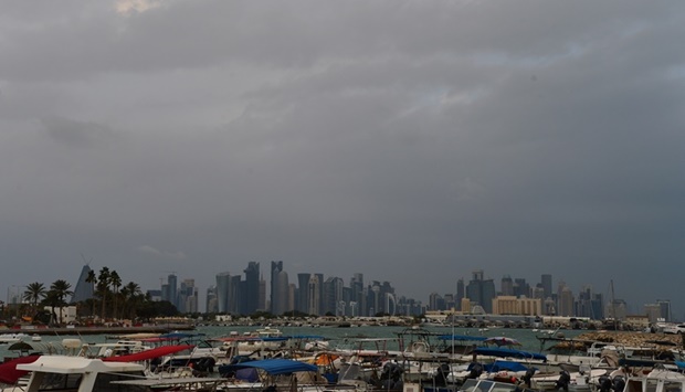 A view of Doha city Tuesday evening with rain clouds gathering in the skies. PICTURES: Shaji Kayamkulam