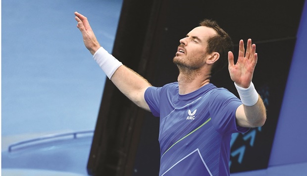 Britainu2019s Andy Murray celebrates after beating Georgiau2019s Nikoloz Basilashvili in their Australian Open first round match at the Melbourne Park yesterday. (AFP)