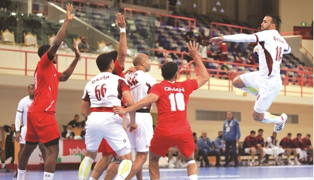 Action from Qatar-Oman match at the Asian Menu2019s Handball Championship in Al Qatif, Saudi Arabia yesterday.