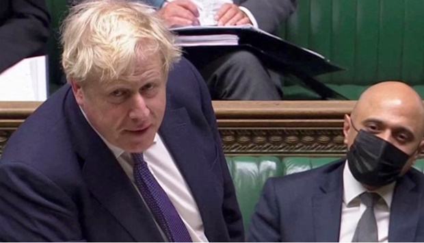 British Prime Minister Boris Johnson speaks during the weekly question time debate at Parliament in London, Britain, January 5, 2022, in this screen grab taken from video.