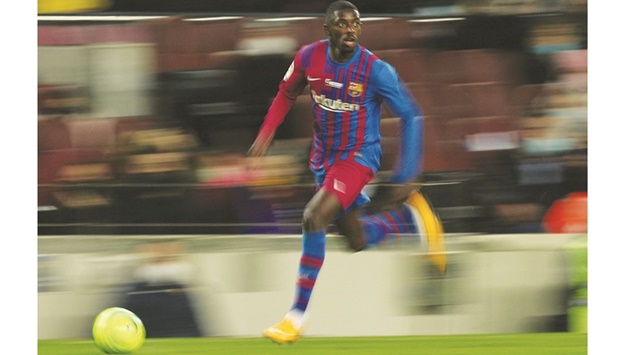 Barcelonau2019s Ousmane Dembele in action against Elche during a La Liga match at the Camp Nou in Barcelona on December 18, 2021. (Reuters)
